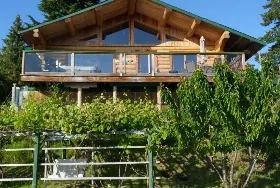 Photograph of Sand Dollar Log Cabin, Gillies Bay